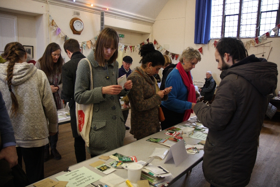 Seed swapping at a previous Seedy Sunday event in the Village Hall.